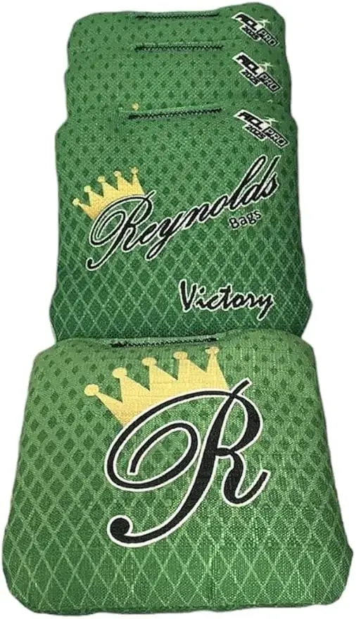 Green Reynolds cornhole bags from the Victory series, designed for controlled throws and a consistent feel during competitive games.