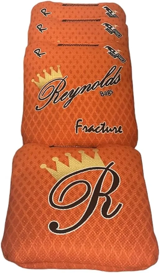 Orange Reynolds cornhole bags from the Fracture series, featuring a durable fabric and smooth texture for advanced play.