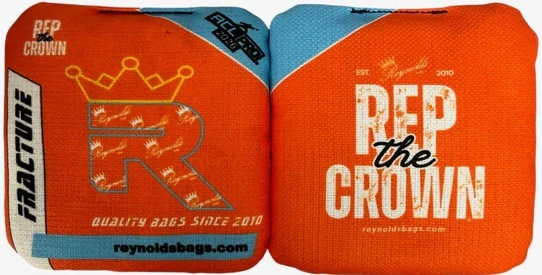 Orange Reynolds cornhole bags from the Fracture series, featuring a durable fabric and smooth texture for advanced play.