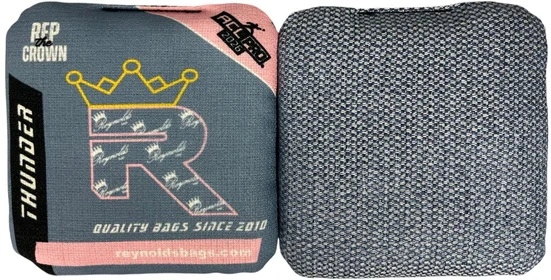 Light gray Reynolds cornhole bags from the Thunder series, delivering a perfect mix of speed and grip for strategic gameplay.