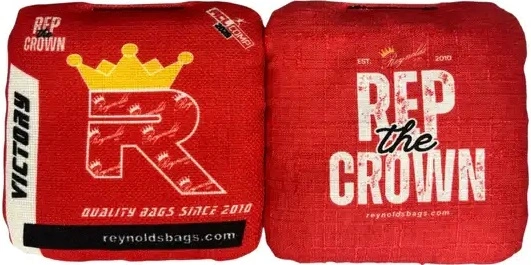 Red Reynolds cornhole bags from the Victory series, designed for controlled throws and a consistent feel during competitive games.