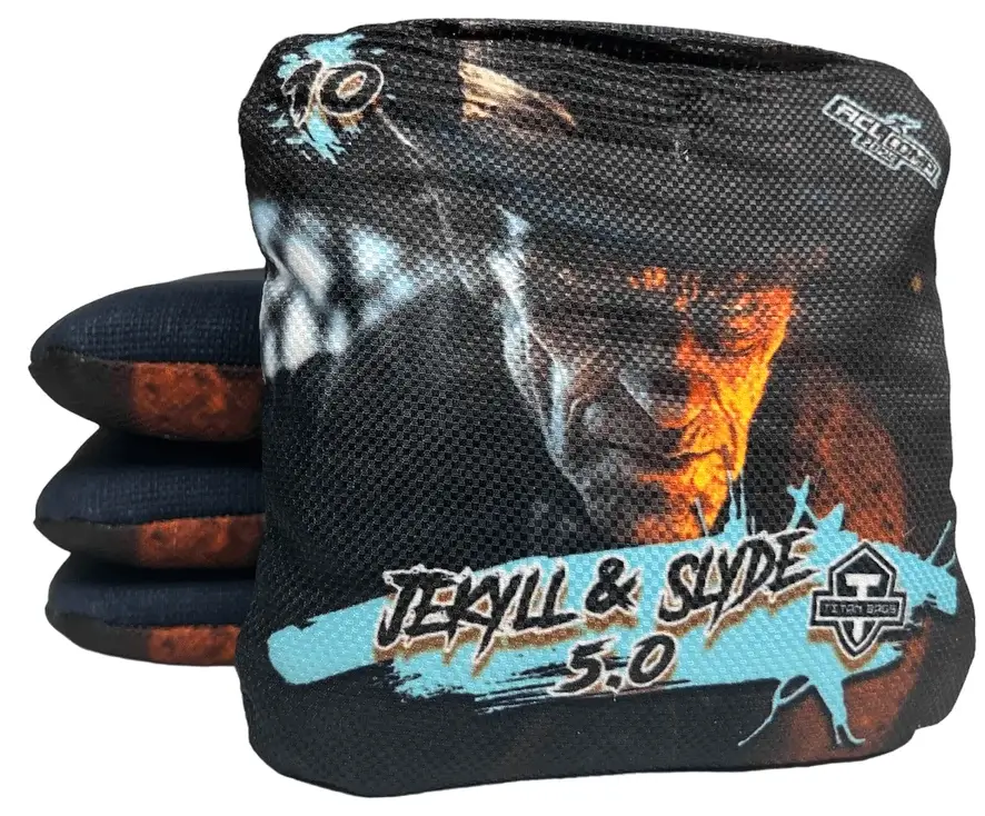 A set of Titan Cornhole bags from the Jekyll & Slyde 5.0 series, featuring a dark and intense design with a shadowy figure on a smoky background. The text 'JEKYLL & SLYDE 5.0' is boldly displayed along with the Titan Bags logo, and a speed rating of 10 is shown in the upper left corner, highlighting its extreme speed and slick play style.