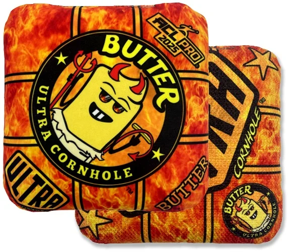 Butter Orange Loosifer Ultra Cornhole Bag: This Ultra Cornhole bag stands out with its fiery orange and red design. At the center is a mischievous, devilish stick of butter (Loosifer), adding a playful yet fierce vibe. Flames surround the character, embodying the heat of competition. The bold "Butter" name emphasizes the bag’s smooth playability. The reverse side showcases a deep red pattern, offering great hand feel and control on the boards.