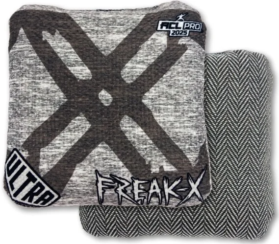 Freak X Greystone Ultra Cornhole Bag: This bag displays a bold "X" symbol across the front, with a dark gray stone-like texture. The edgy, graffiti-like design enhances its "Freak X" branding. The reverse side has a black-and-white chevron pattern, providing a reliable grip and feel. This Ultra Cornhole bag is perfect for players looking for durability and consistent slide, with an attitude to match.