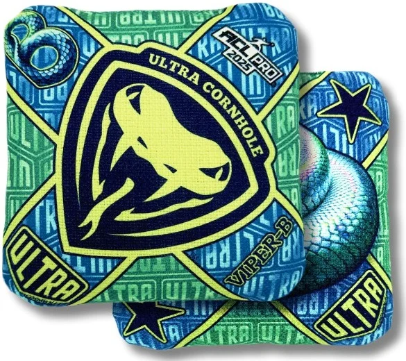 Viper B Emerald Prism Ultra Cornhole Bag: The Ultra Viper bag is bright with a green and blue color palette, featuring a fierce viper graphic at the center. The design includes star patterns and a snake scale texture to match the aggressive "Viper B" branding. The reverse side has a unique texture that allows for controlled slides and stops, making it a versatile bag on the boards.