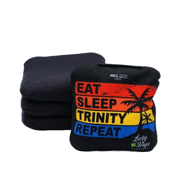 Trinity cornhole bags by Lucky Bags Cornhole featuring a black design with a colorful 'Eat Sleep Trinity Repeat' graphic and the ACL Pro 2024 logo