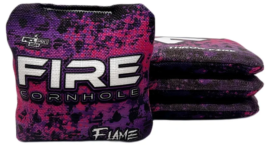 Set of Fire Cornhole bags from the Flame series, showcasing a striking purple and pink flame-like pattern. The text 'FIRE CORNHOLE' and 'Flame' is prominently displayed on the bags.