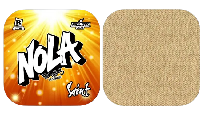 A split view showing the front and back of a Nola "Saint" cornhole bag. The graphic side features a vibrant orange sunburst background with large white graffiti-style "NOLA" text and an ACL PRO 2026 stamp, while the reverse side is plain tan woven fabric.