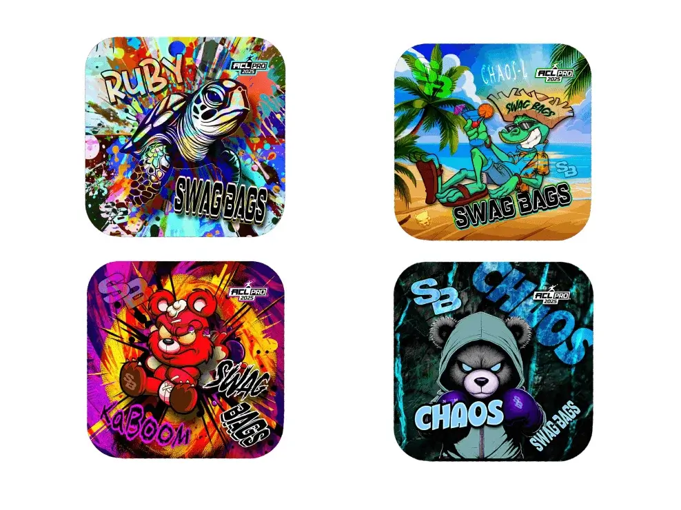 The image shows four square designs, likely for stickers or patches. Each design features a vibrant, cartoonish illustration and the text "SWAG BAGS." The designs are: Top Left: A turtle with a colorful background and the word "RUBY" above it. Top Right: A frog relaxing under a palm tree with the word "CHAOS" above it. Bottom Left: A boxing teddy bear with a colorful background and the words "ACL 2023" and "SWAG BAGS" below it. Bottom Right: A boxing teddy bear with a colorful background and the words "CHAOS" and "SWAG BAGS" below it.